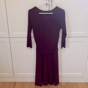 Plum ruched waist dress with 3/4 sleeve.